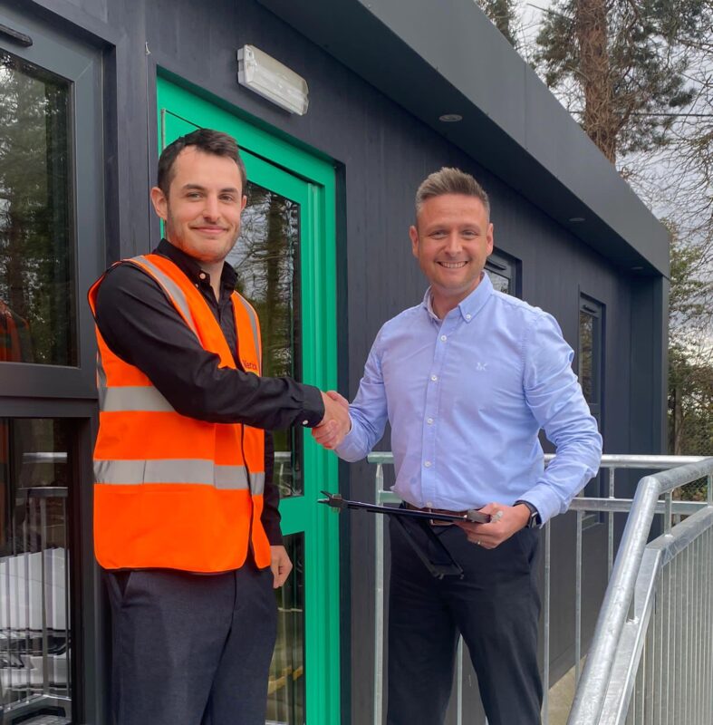 Image of two employees